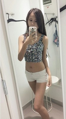 Gorgeous asian teen in this picture.