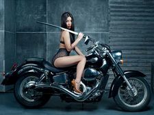 Sexy asian girl on bike.